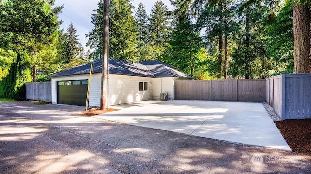 view of property exterior with a garage