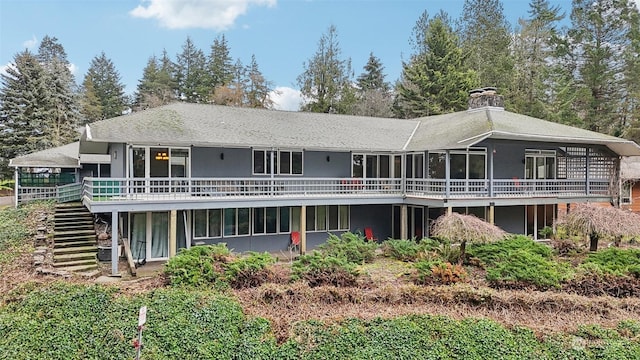 rear view of house with a deck