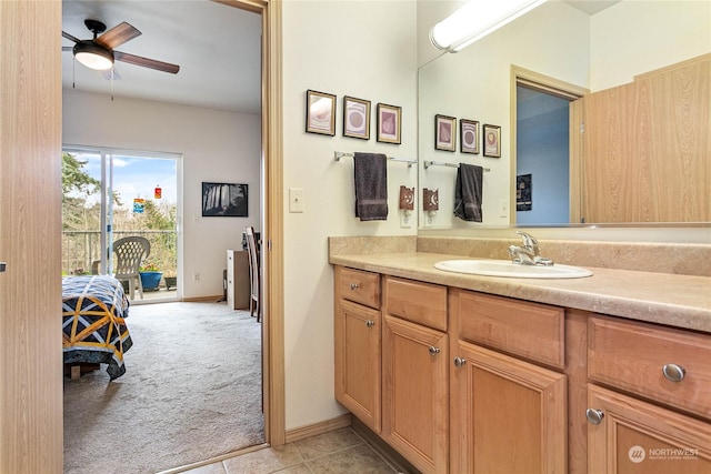 bathroom featuring vanity, tile patterned floors, and ceiling fan