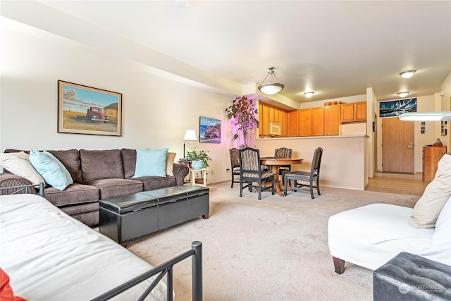 living room with light colored carpet