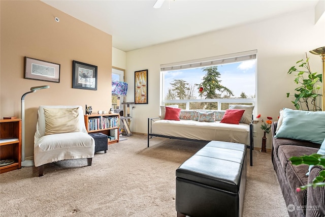 interior space with ceiling fan