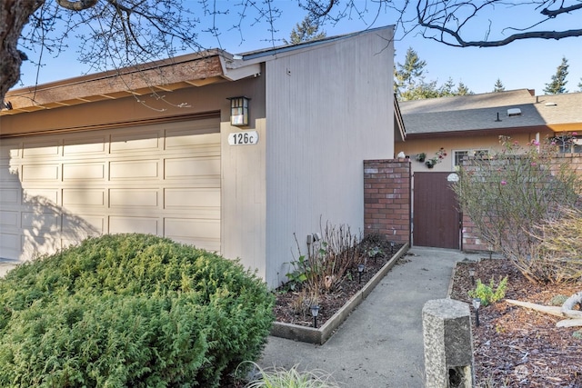 view of home's exterior featuring a garage