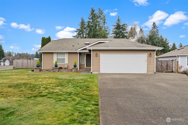 single story home with a front lawn and a garage