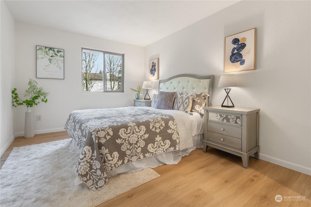 bedroom with light hardwood / wood-style floors