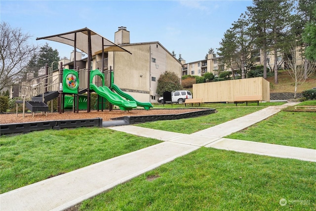 view of playground featuring a yard