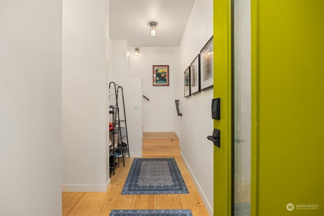 corridor featuring light wood-type flooring