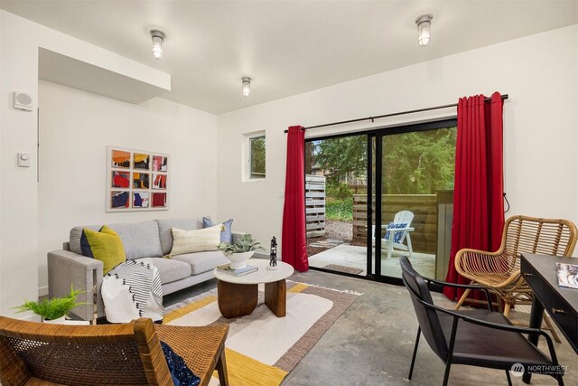 living room with concrete floors