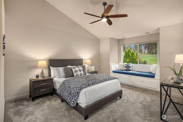 carpeted bedroom featuring ceiling fan and lofted ceiling