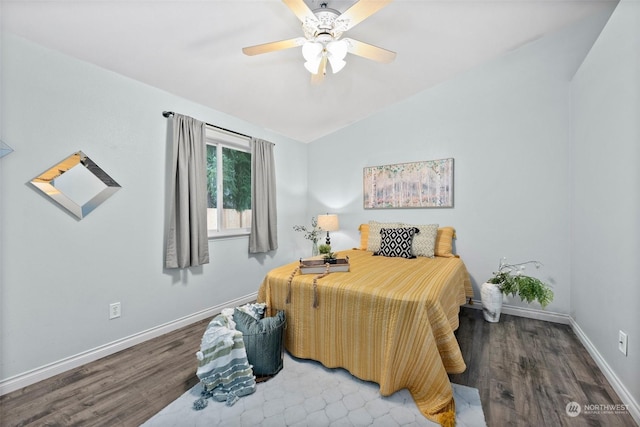 bedroom featuring lofted ceiling, ceiling fan, and hardwood / wood-style floors