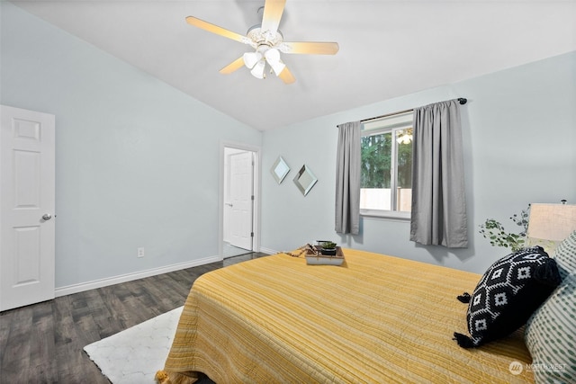 bedroom with lofted ceiling, dark wood-type flooring, and ceiling fan