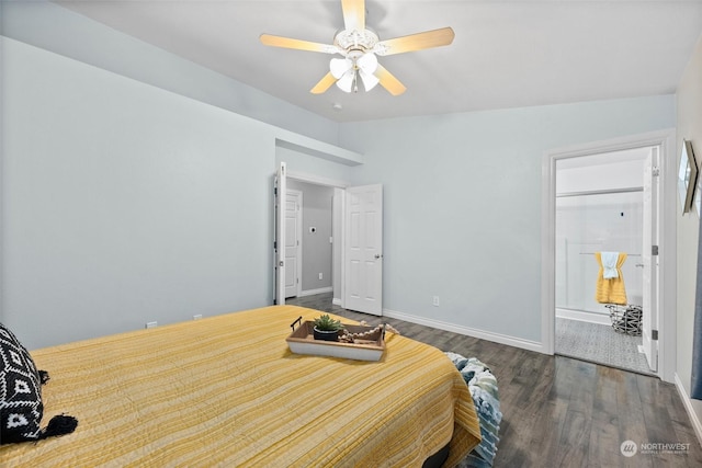 bedroom with ceiling fan, dark wood-type flooring, and lofted ceiling