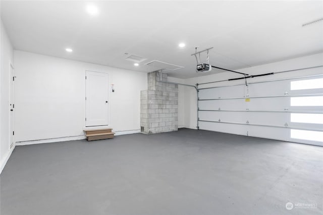 garage featuring a garage door opener