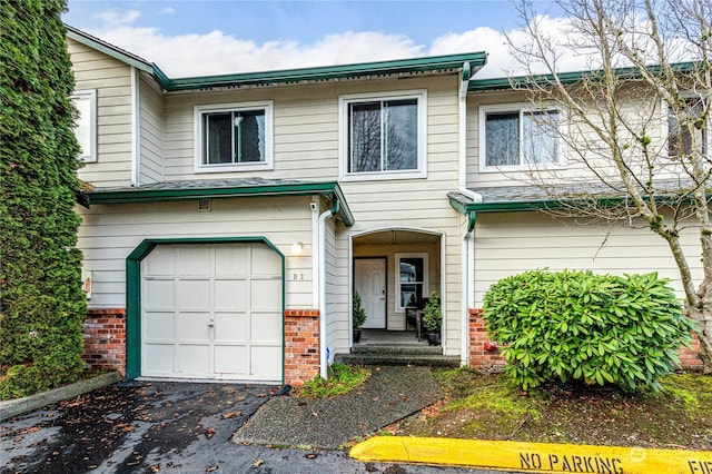 view of front of home with a garage