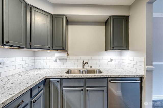 kitchen with dishwasher, gray cabinets, and sink