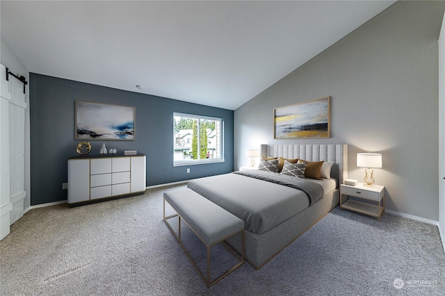 bedroom featuring light carpet, a barn door, and vaulted ceiling