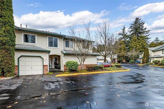 view of property featuring a garage