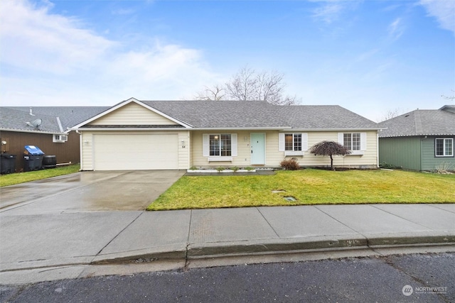 ranch-style home featuring a front lawn and a garage