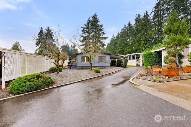 view of front of house featuring a carport