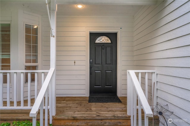 entrance to property with covered porch