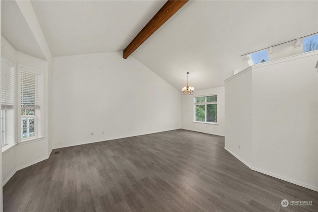 empty room with dark hardwood / wood-style flooring, lofted ceiling with beams, and an inviting chandelier