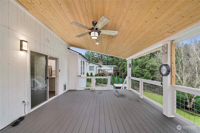 wooden terrace with ceiling fan