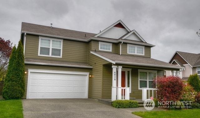 craftsman-style home with a garage