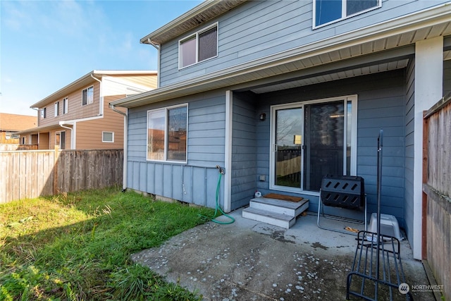 back of property featuring a patio