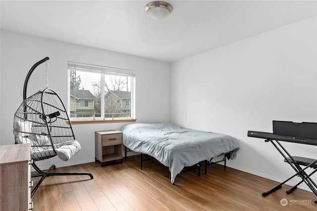 bedroom with hardwood / wood-style floors