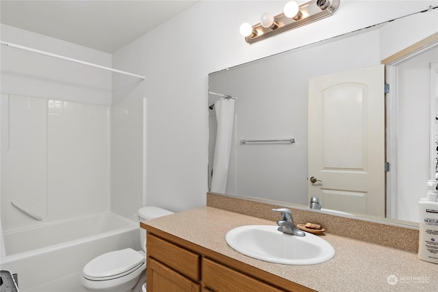 full bathroom with toilet, vanity, and shower / bath combo