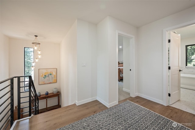 hallway with light wood-type flooring