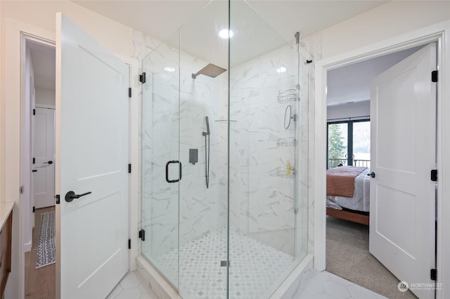 bathroom with tile patterned floors and a shower with shower door