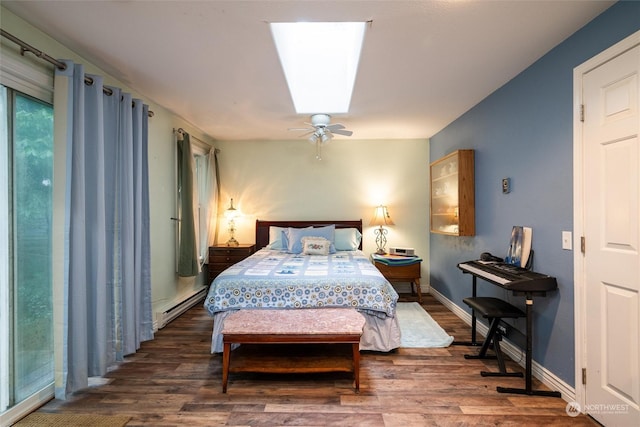 bedroom featuring ceiling fan, dark wood-type flooring, and a baseboard radiator