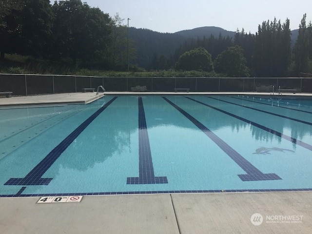 view of pool featuring a mountain view