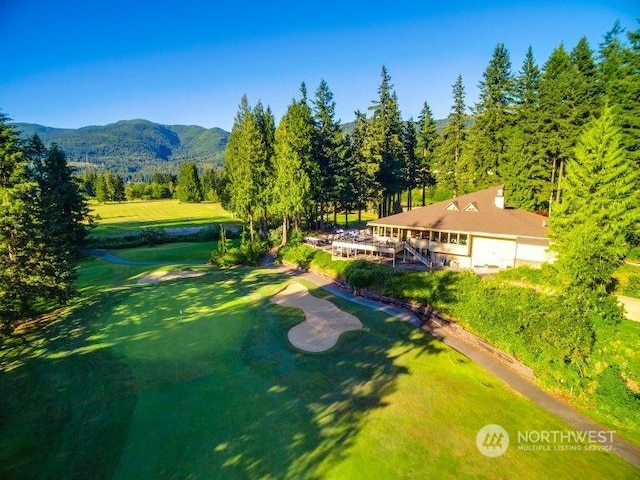 drone / aerial view featuring a mountain view