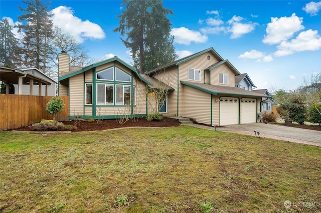 view of front facade featuring a front yard and a garage