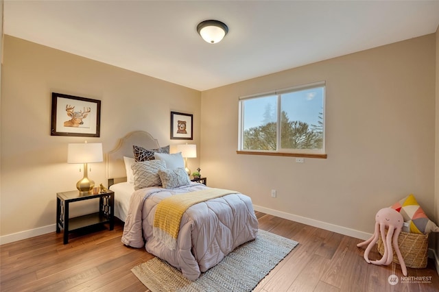 bedroom featuring light hardwood / wood-style flooring