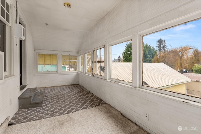 unfurnished sunroom with vaulted ceiling