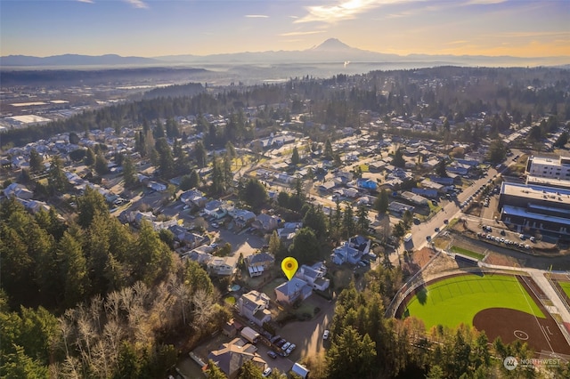 aerial view at dusk with a mountain view