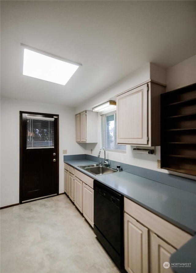 kitchen featuring sink and black dishwasher