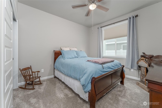 carpeted bedroom featuring ceiling fan