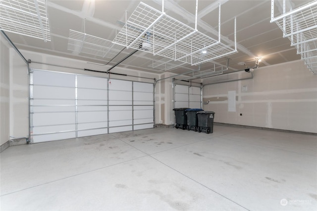 garage featuring a garage door opener