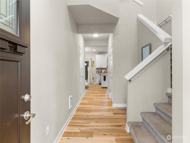 entrance foyer featuring light hardwood / wood-style floors