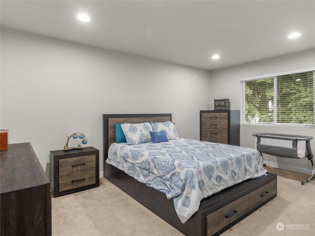 bedroom with light colored carpet