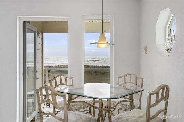 dining area with a water view