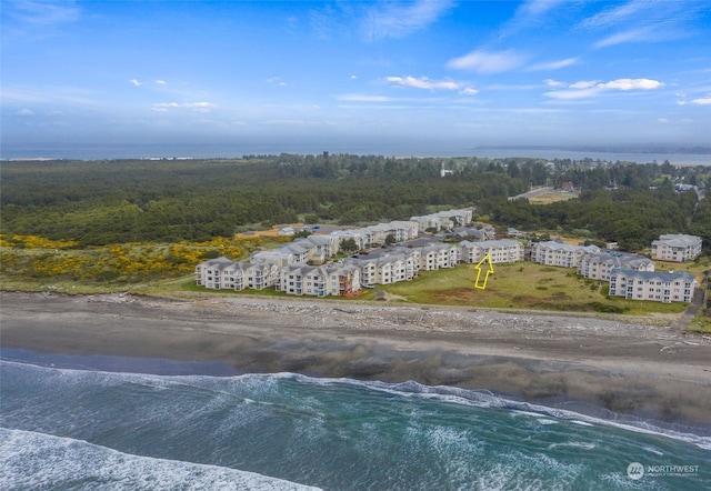 aerial view featuring a water view and a view of the beach