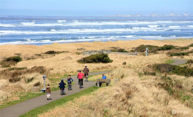 surrounding community with a water view