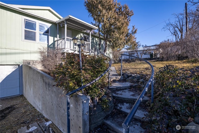 view of side of property featuring a garage