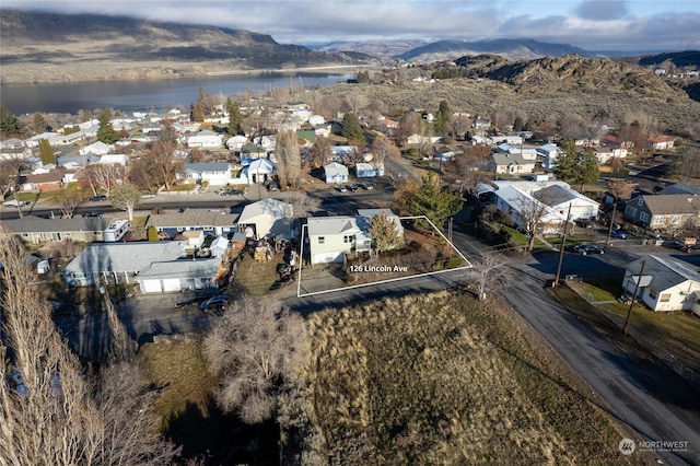 aerial view with a water and mountain view