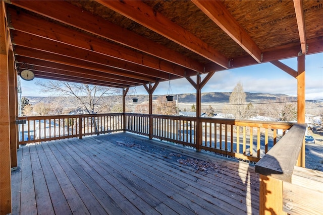 wooden terrace with a mountain view