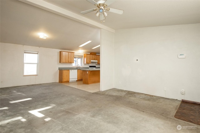 interior space featuring ceiling fan, lofted ceiling with beams, and light carpet